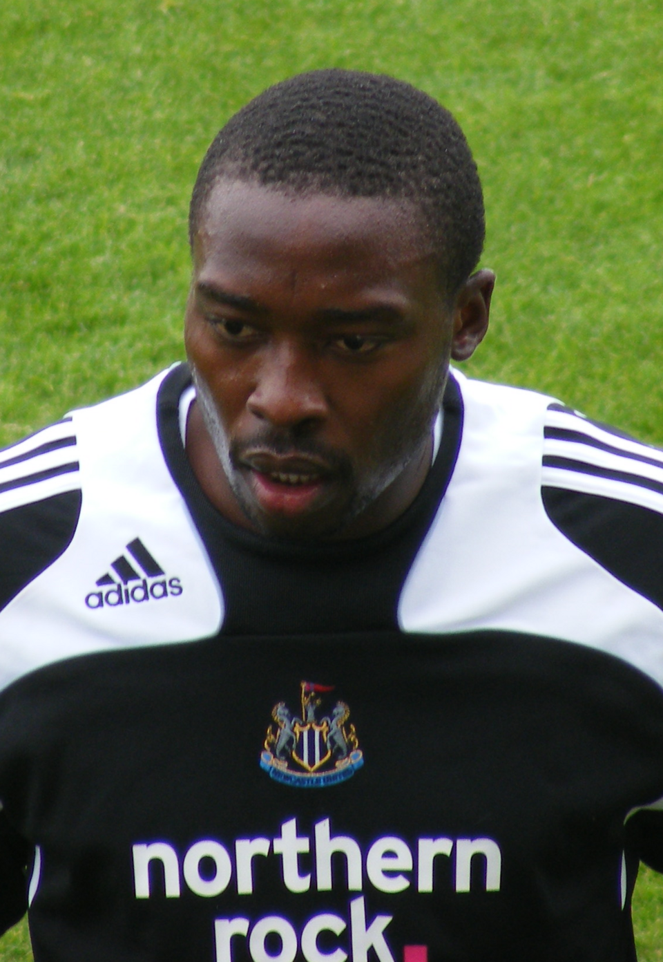 Chris Shola